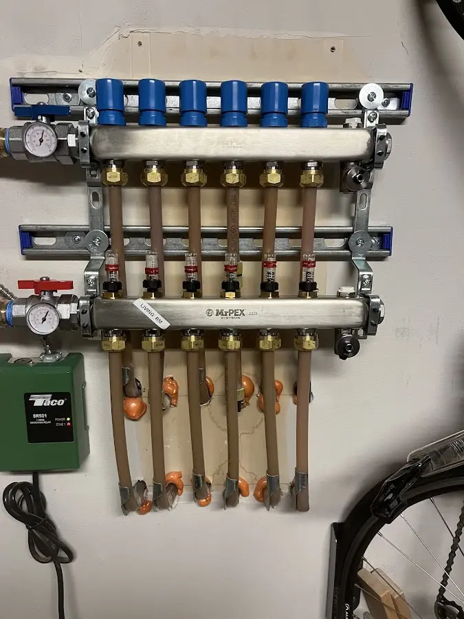 Plumber performing Gas Leak Detection at a residential property in Frankenmuth